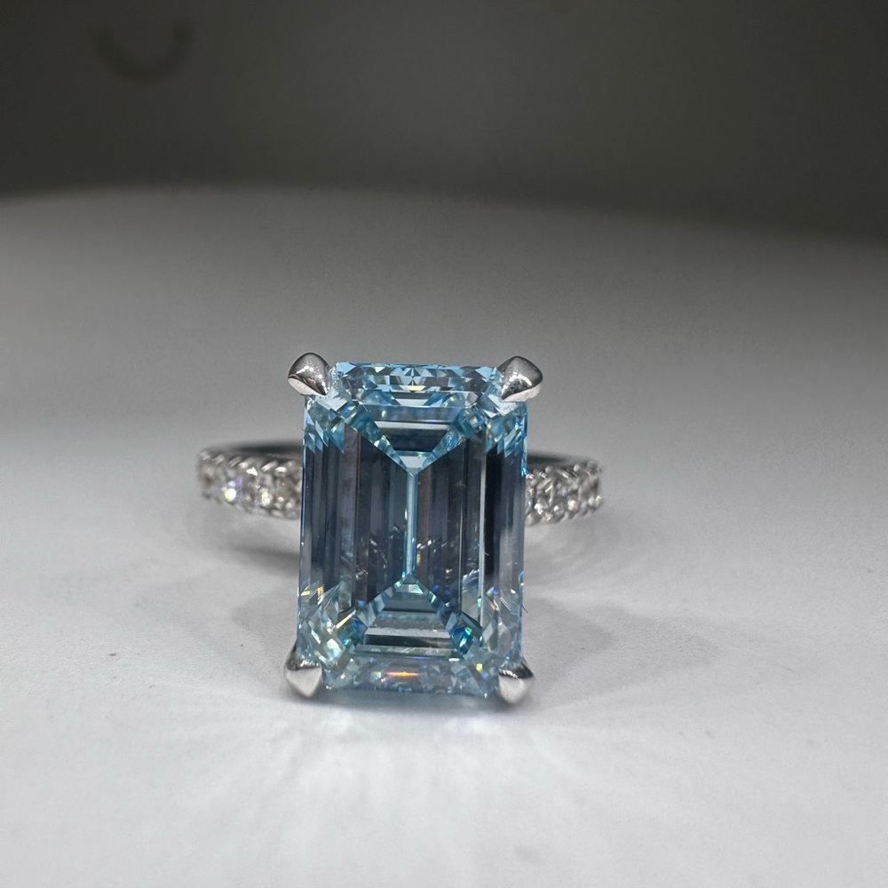 4.04 carat fancy vivid blue vs2 emerald cut diamond ring pavé band